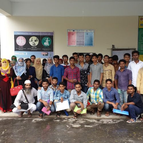 A group of hamimit students and teachers posing for a picture outside the BTEB exam center at TTC, Tangail, during the Jan-Jun $2017$ session.